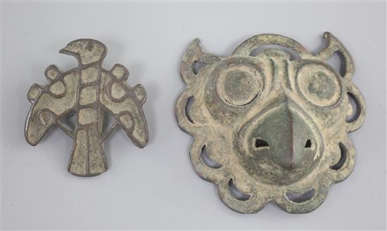 A Chinese archaic bronze owl-head plaque, probably Han dynasty, (4)